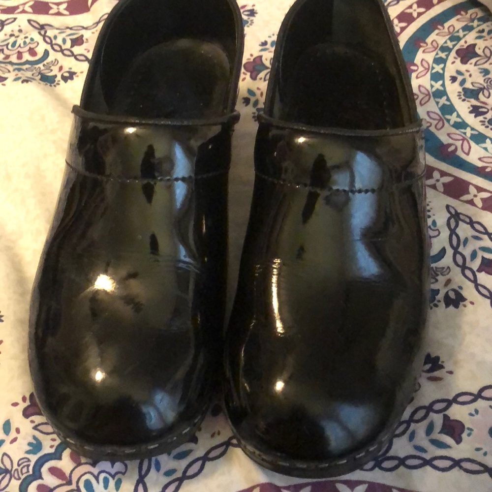 Black patten leather Dansko’s